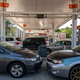 Cars sit at gas pumps in Lynnfield, Massachusetts, on July 19, 2022.